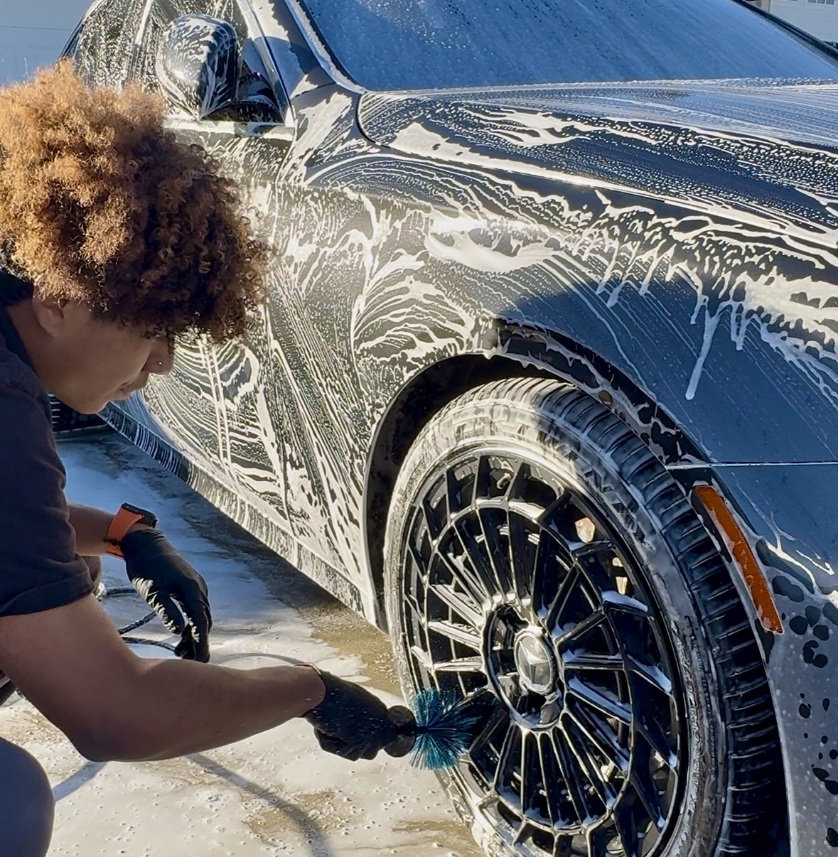 Corey detailing a car